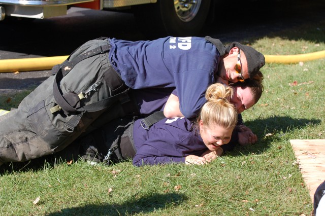 Robert trying to hold down two women